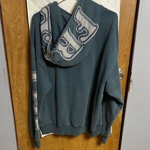 We The Free dark teal hoodie with cream logo trim / 168 original tag price